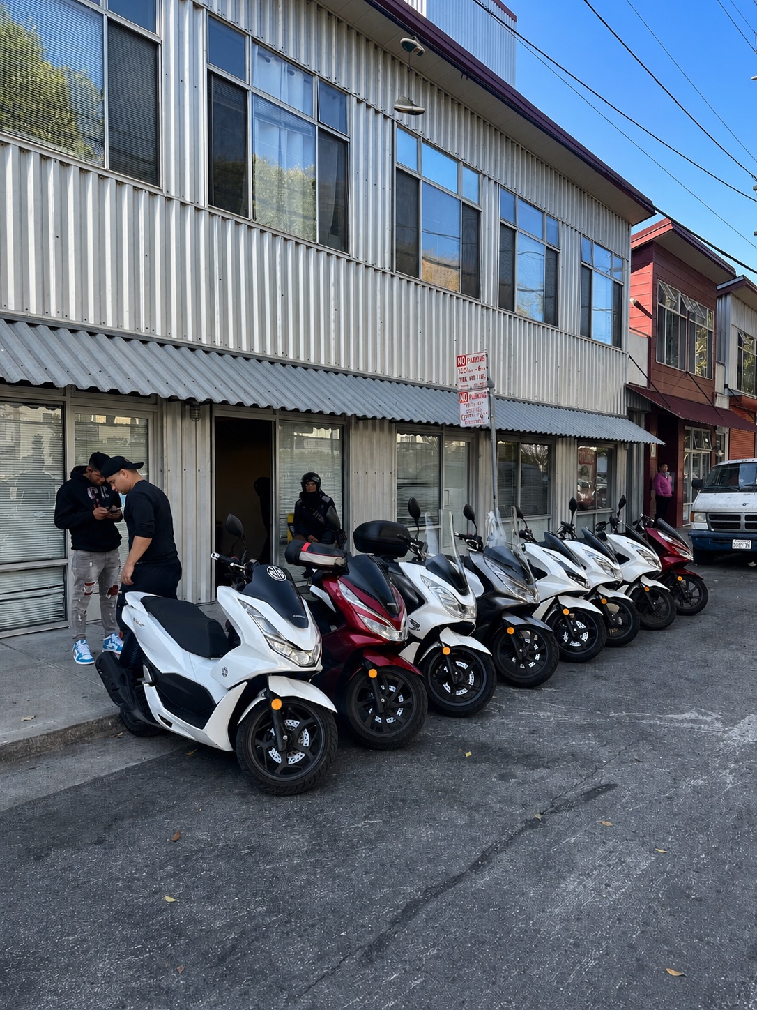Scooters lined up outside the Real Facts workshop in San Francisco