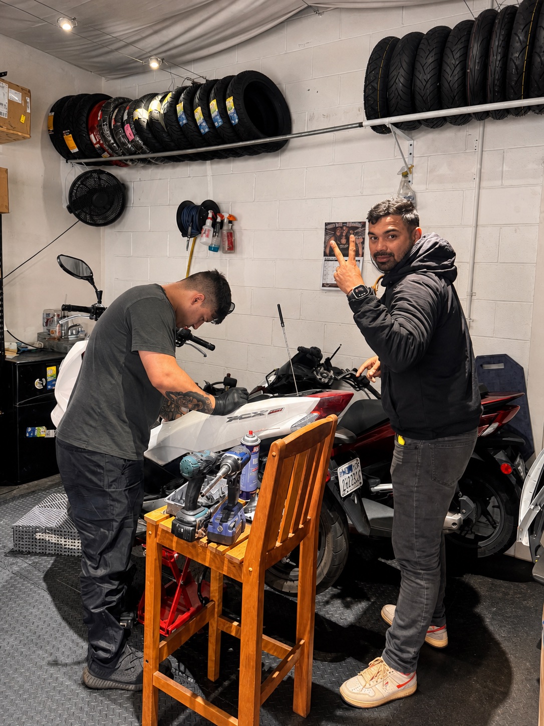 Real Facts team servicing a Yamaha XMAX scooter